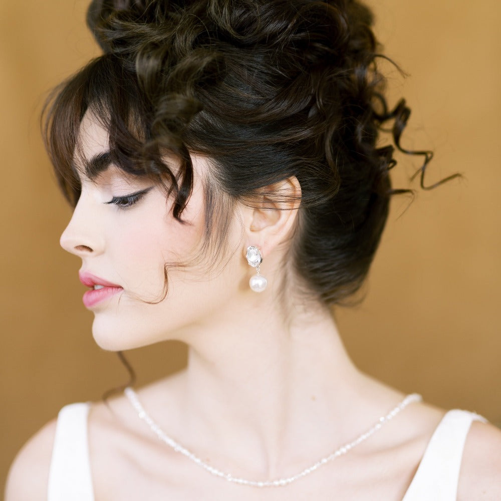 statement large oval rhinestone stud earrings with large round pearl drops. Available in silver, gold, rhodium silver and rose gold with white or ivory pearls. Handmade in Toronto Ontario Canada - Blair Nadeau Bridal Adornments
